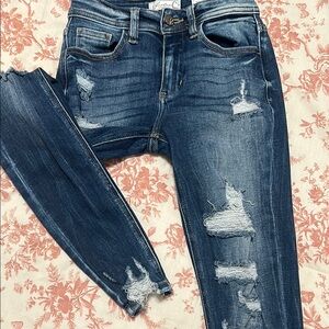 Women's Distressed Blue Jeans
